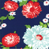 The Good Life Floral Navy fabric by Bonnie & Camille for Moda Fabrics featuring oversized coral red, aqua, and white flowers with green leaves on a navy blue background.