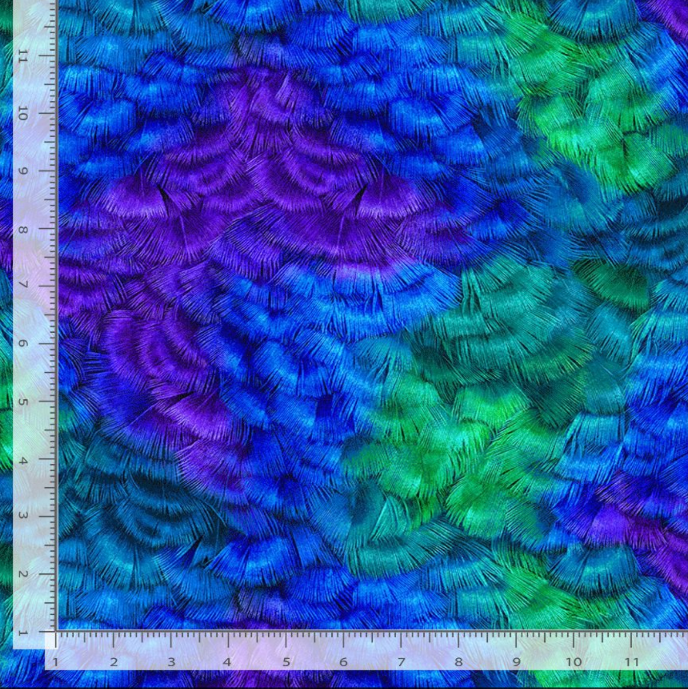Packed Feathers fabric by Chong-A Hwang for Timeless Treasures featuring layered peacock-inspired feathers in vibrant blue, teal, green, and purple jewel tones on premium cotton fabric.