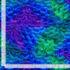 Packed Feathers fabric by Chong-A Hwang for Timeless Treasures featuring layered peacock-inspired feathers in vibrant blue, teal, green, and purple jewel tones on premium cotton fabric.