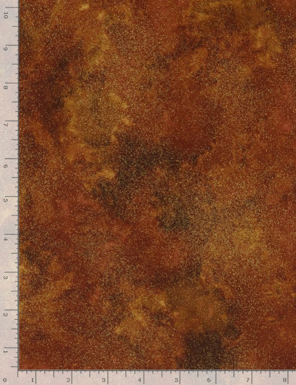 Holiday Blenders Shimmer Rust fabric by Timeless Treasures featuring a rich rust-colored marbled texture with subtle metallic shimmer accents on premium quilting cotton.