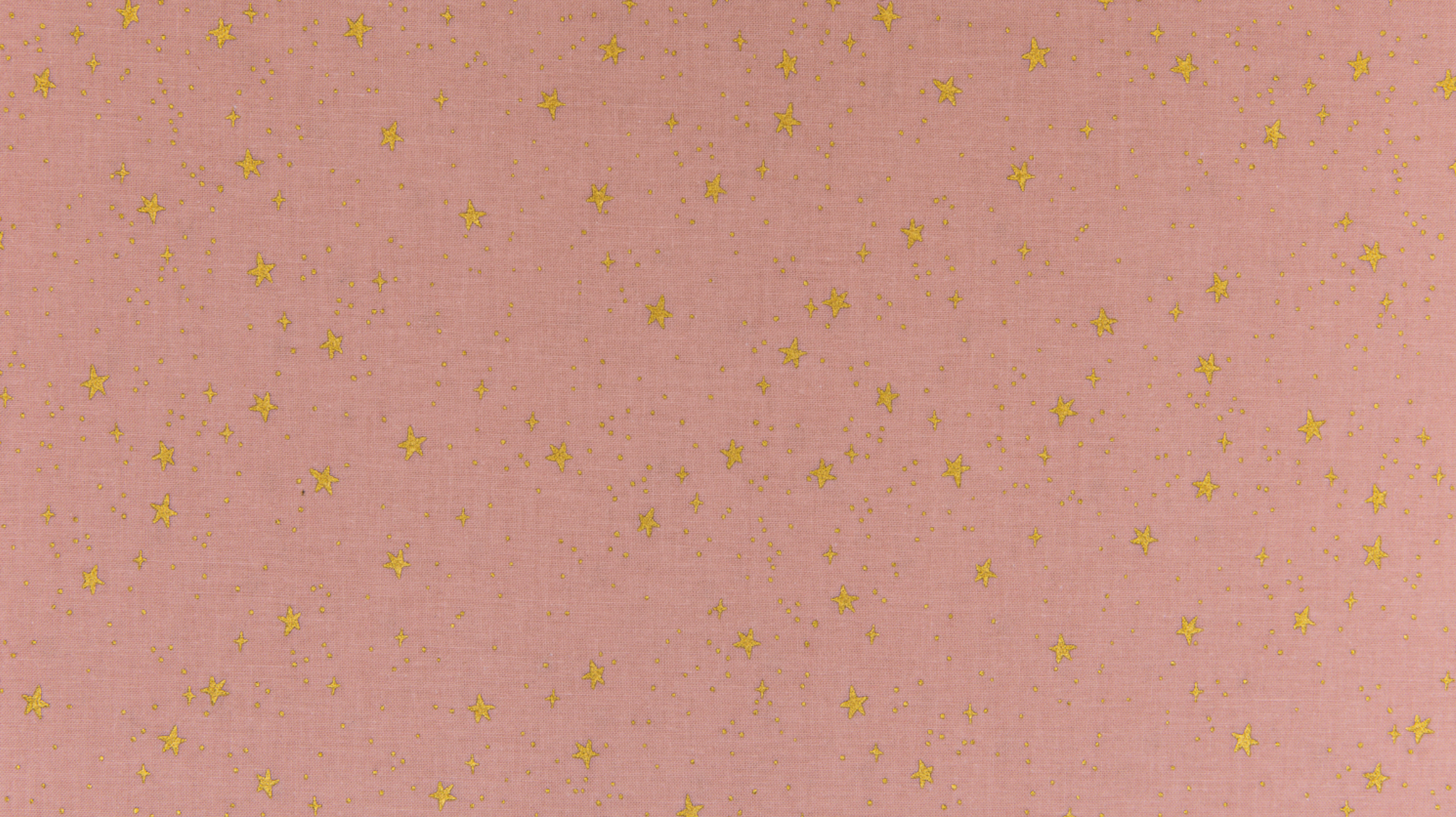 Primavera Stars Blush Metallic fabric by Rifle Paper Co. featuring shimmering metallic gold stars scattered across a soft blush pink background.
