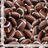 Timeless Treasures Packed Footballs cotton fabric featuring realistic brown footballs with white laces and stripes in an all-over digital print.