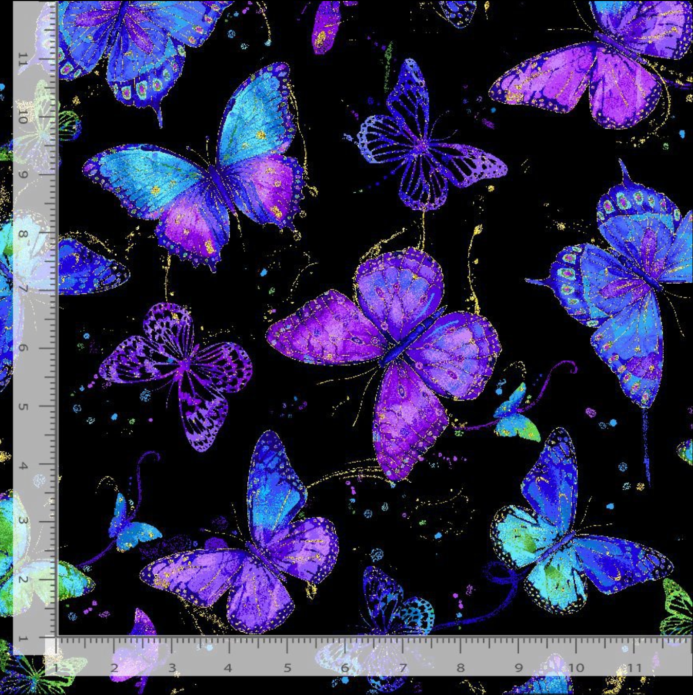 Evening Glow Flying Butterflies metallic cotton fabric by Chong-A Hwang featuring blue, purple, and teal butterflies with shimmering gold metallic accents on a black background.