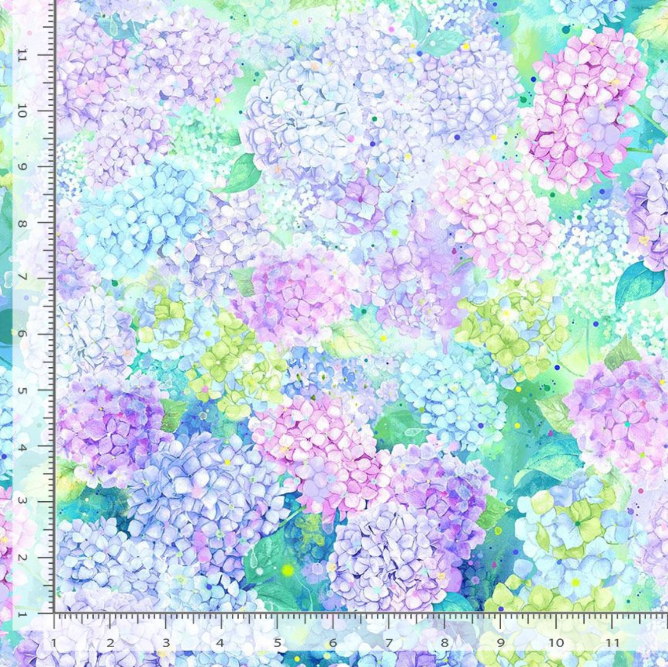 Hydrangea Dream Hydrangea Floral cotton fabric by Timeless Treasures featuring watercolor hydrangea blossoms in pastel lavender, blue, pink, and green.