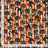 Wicked Willow Trick or Treat Cats fabric by Timeless Treasures featuring vintage black cats, orange striped background, stars, and retro Halloween signs.