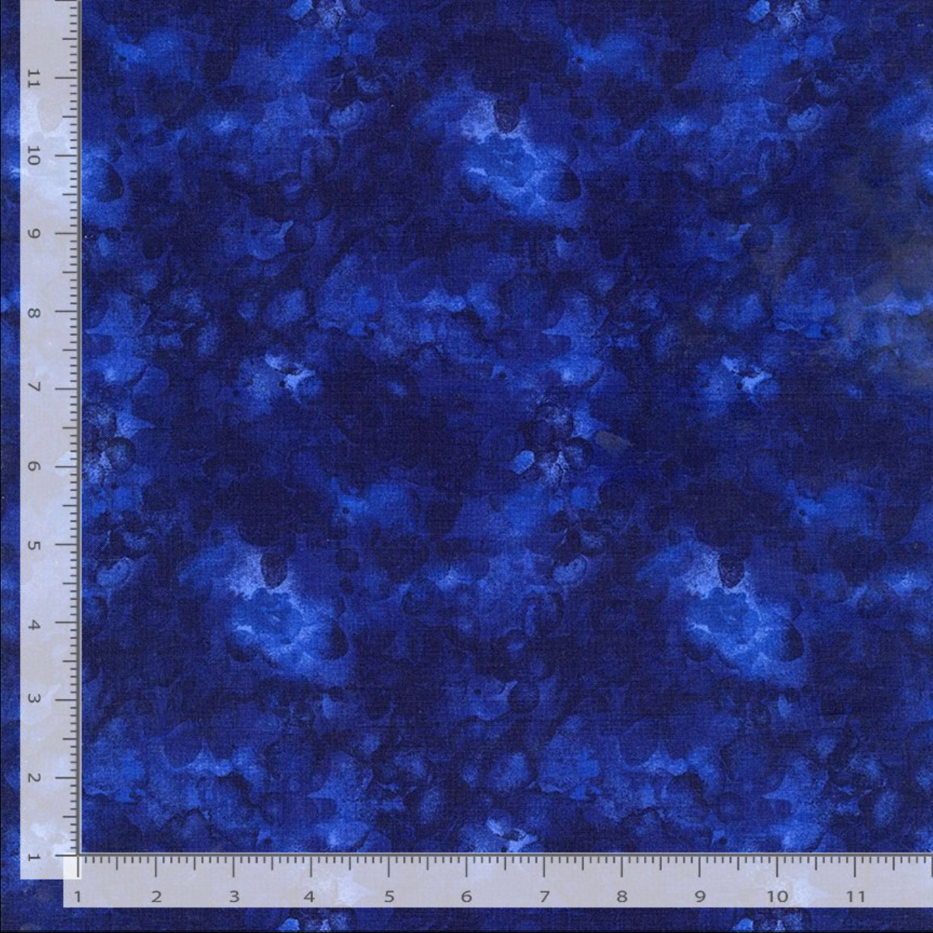 Rich indigo blue watercolor texture quilting cotton fabric with a tonal mottled design by Kimberly Einmo for Timeless Treasures, ideal as a quilt blender or background fabric.