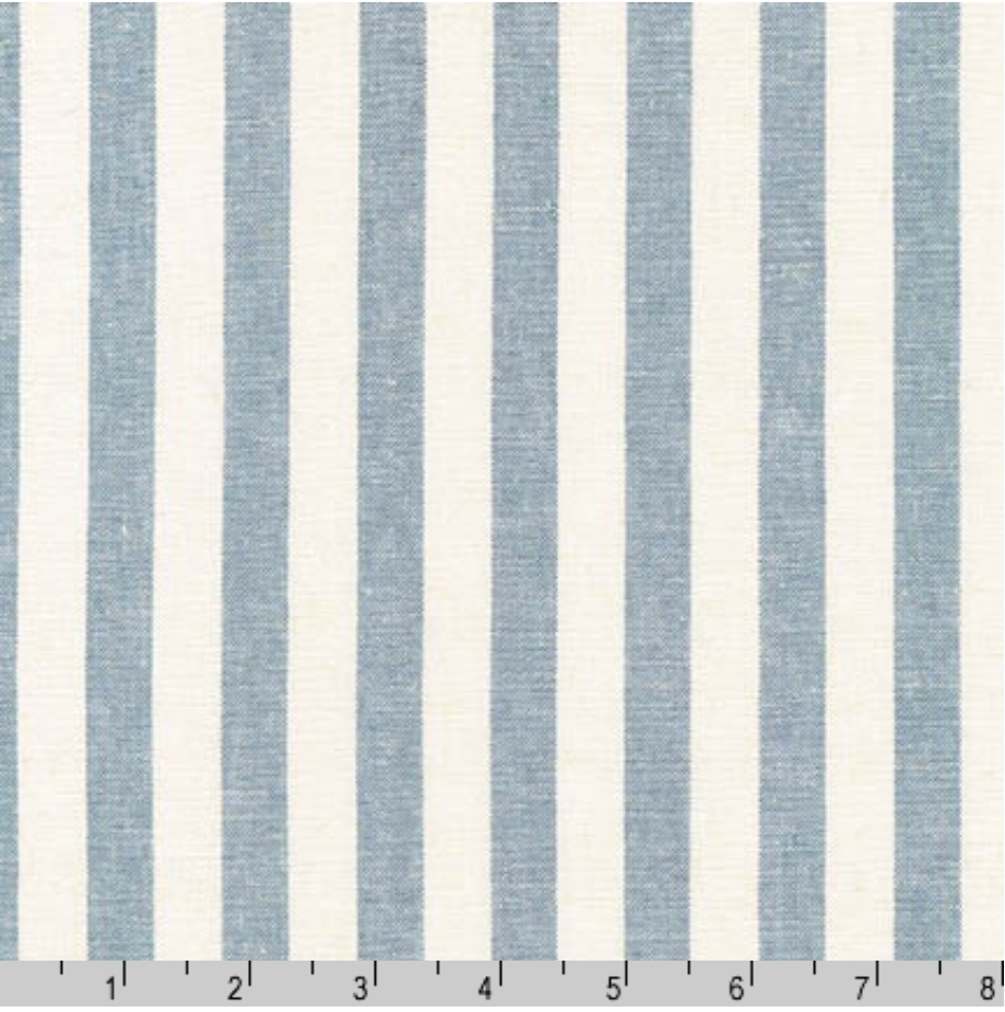 Robert Kaufman Essex Yarn Dyed Chambray Stripe linen cotton woven fabric featuring soft blue vertical stripes on a natural background.