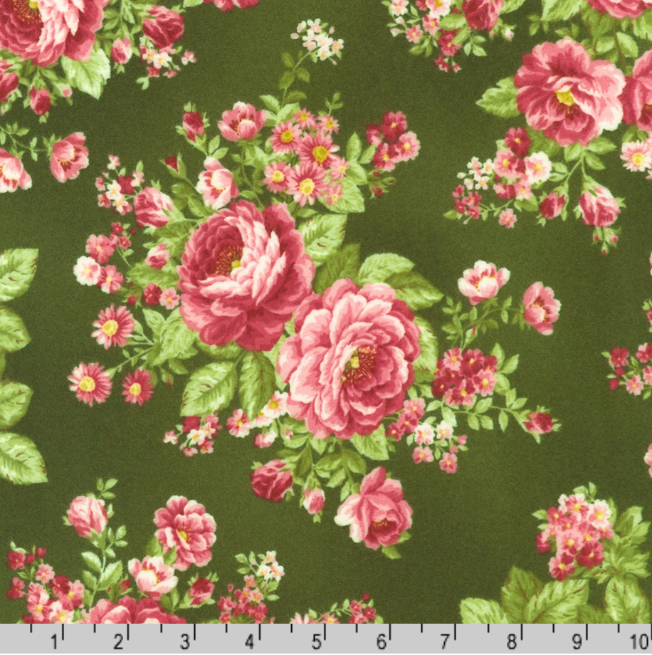 Pink rose bouquets with green leaves on forest green cotton flannel fabric from the Flowerhouse Collection by Debbie Beaves for Robert Kaufman.