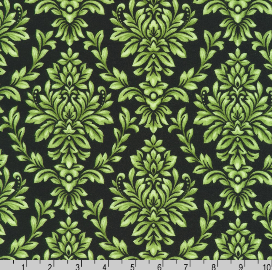 Green damask leaf scroll pattern on black cotton flannel fabric from the Flowerhouse Collection by Debbie Beaves for Robert Kaufman.