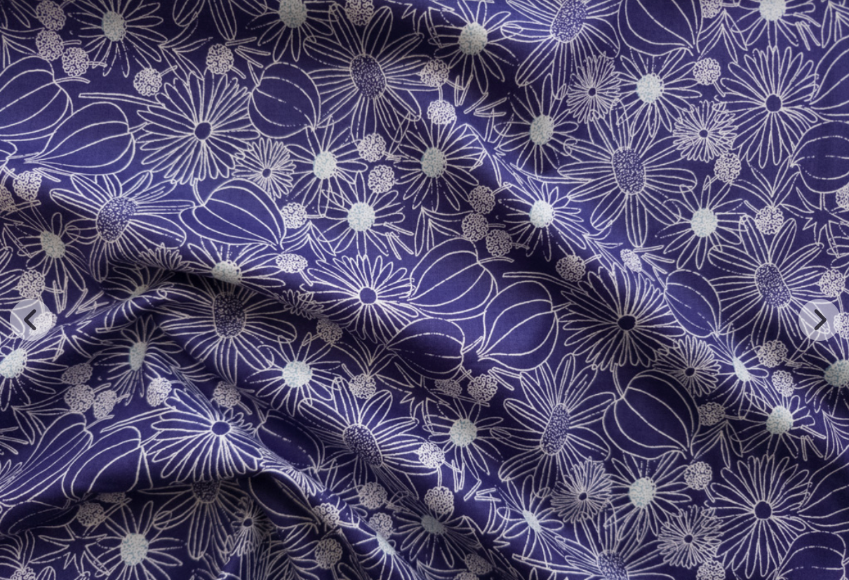 Crystal Lawn Daisy Outline Blue Japanese cotton lawn fabric by Sevenberry for Robert Kaufman featuring delicate white outlined daisies with pale blue centers on a rich blue background.