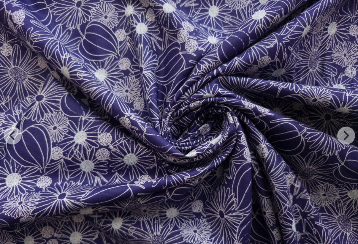 Crystal Lawn Daisy Outline Blue Japanese cotton lawn fabric by Sevenberry for Robert Kaufman featuring delicate white outlined daisies with pale blue centers on a rich blue background.