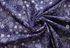 Crystal Lawn Daisy Outline Blue Japanese cotton lawn fabric by Sevenberry for Robert Kaufman featuring delicate white outlined daisies with pale blue centers on a rich blue background.