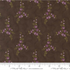 Collections Essence Meandering Path Florals Soil fabric by Howard Marcus for Moda Fabrics featuring delicate lavender floral vines on a rich soil brown premium cotton background.