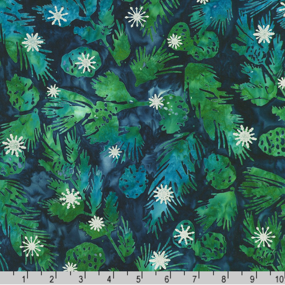 Artisan Batiks Evergreen Ice Sparkle Frosted Pinecones Midnight batik fabric featuring green pinecones and evergreen branches with silver metallic accents on a deep blue hand-dyed background.