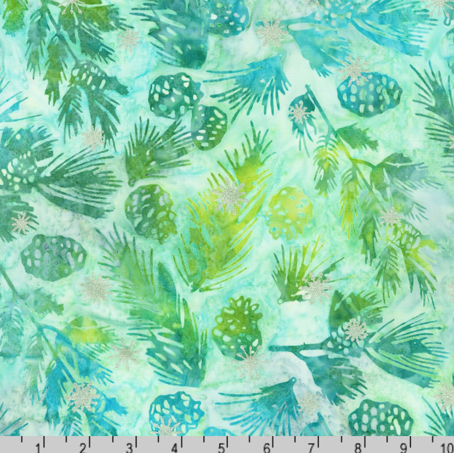 Artisan Batiks Evergreen Ice Sparkle Frosted Pinecones Turquoise batik fabric featuring green pinecones and evergreen branches with silver metallic accents on a turquoise and aqua hand-dyed background.