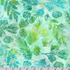 Artisan Batiks Evergreen Ice Sparkle Frosted Pinecones Turquoise batik fabric featuring green pinecones and evergreen branches with silver metallic accents on a turquoise and aqua hand-dyed background.