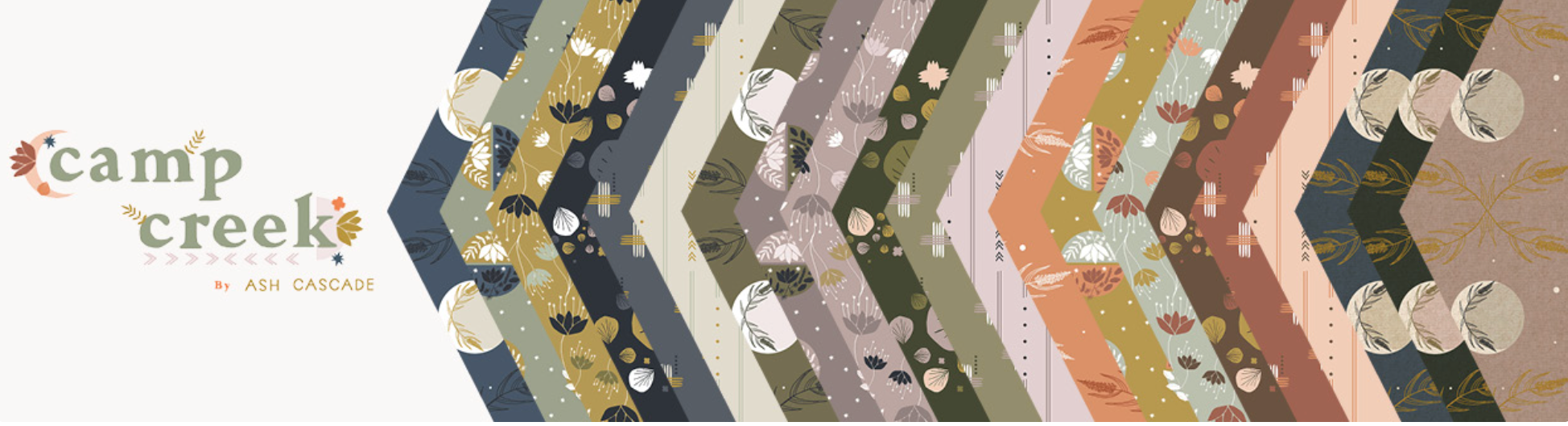 Camp Creek 10x10 Layer Cake by Ash Cascade for RJR Fabrics featuring 42 premium cotton precut squares with woodland, botanical, celestial, floral, and nature-inspired prints in earthy sage, olive, charcoal, peach, mustard, taupe, and blue tones.