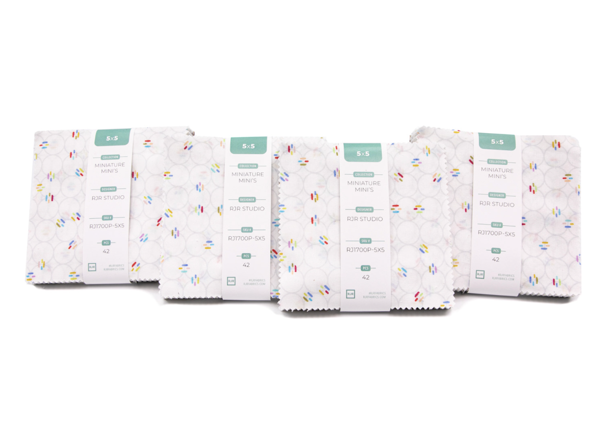 Miniature Minis 5x5 Charm Pack by RJR Studio for RJR Fabrics featuring 42 premium cotton 5-inch squares with coordinating miniature prints including flower bursts, dots, geometric links, springs, and colorful modern blenders on fresh white backgrounds.