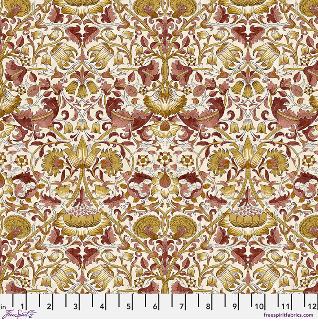 Lodden Main Mulberry fabric by Morris & Co for FreeSpirit, featuring ornate scrolling flowers, vines, and leaves in rust, mulberry, gold, cream, and neutral tones.