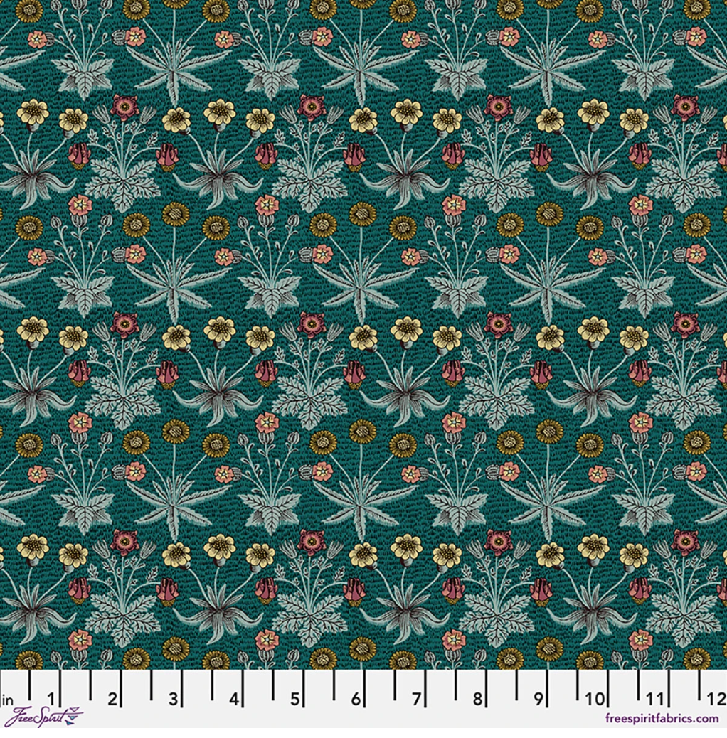 Lodden Daisy Fields Teal fabric by Morris & Co for FreeSpirit, featuring small daisies, flowers, leaves, and botanical motifs in gold, pink, sage, and pale blue on a rich teal background.