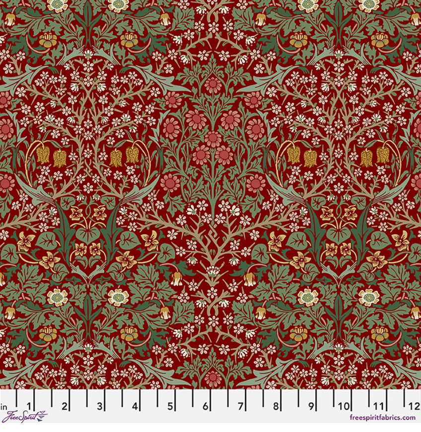 Suffolk Holiday Blackthorn Thorned Rose fabric by Morris & Co for FreeSpirit, featuring sage foliage, rose and cream flowers, and gold botanical accents on a deep red background.