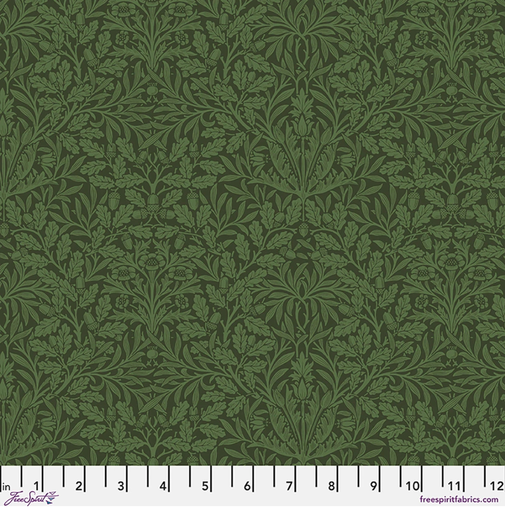 Suffolk Holiday Pure Acorn Olive fabric by Morris & Co for FreeSpirit, featuring tonal acorns, oak leaves, and flowing botanical foliage in layered olive green shades.