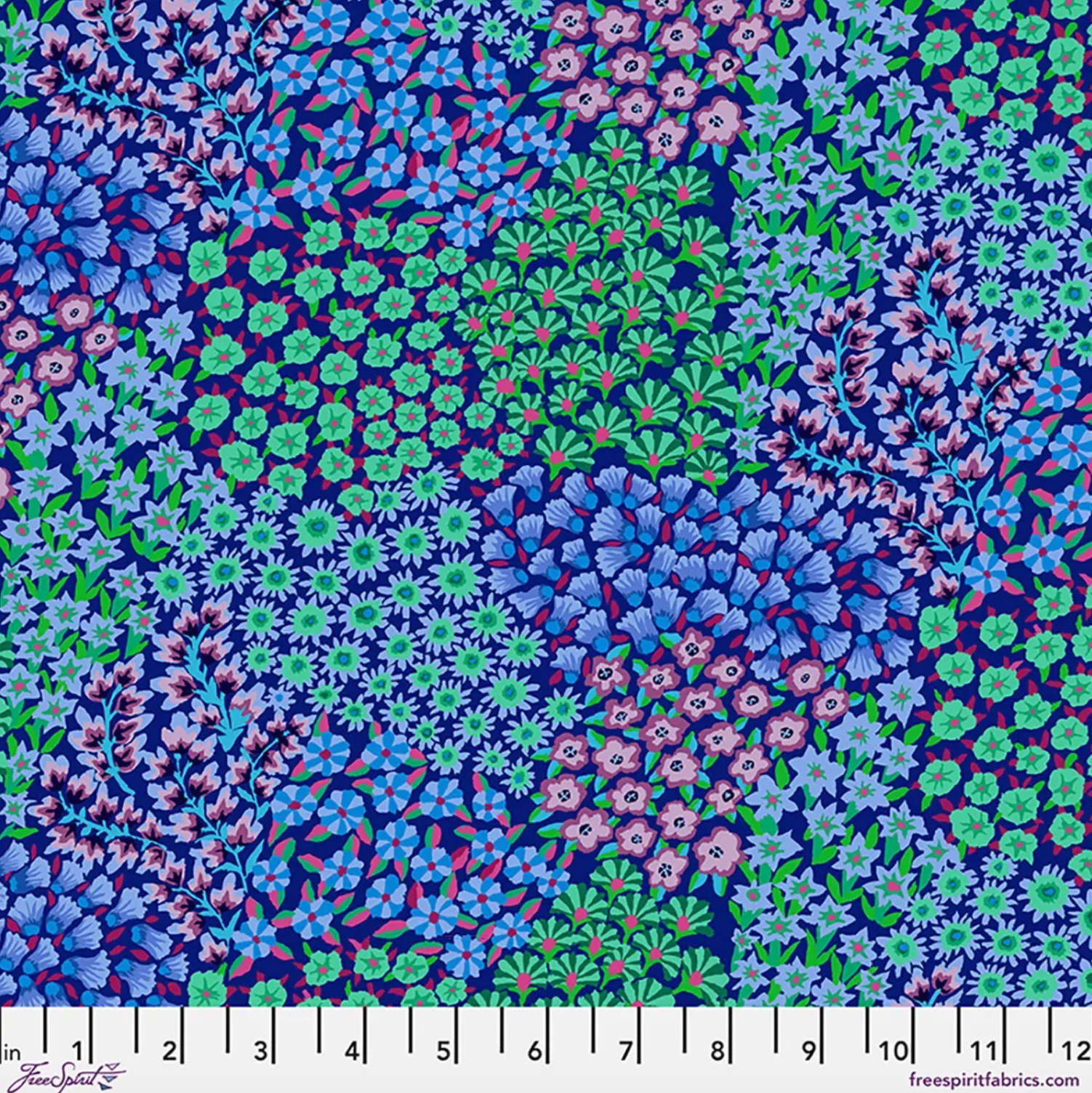 Kaffe Fassett Persian Garden Blue cotton lawn fabric featuring dense floral clusters in navy, cobalt, aqua, green, lavender, pink, and soft blue.