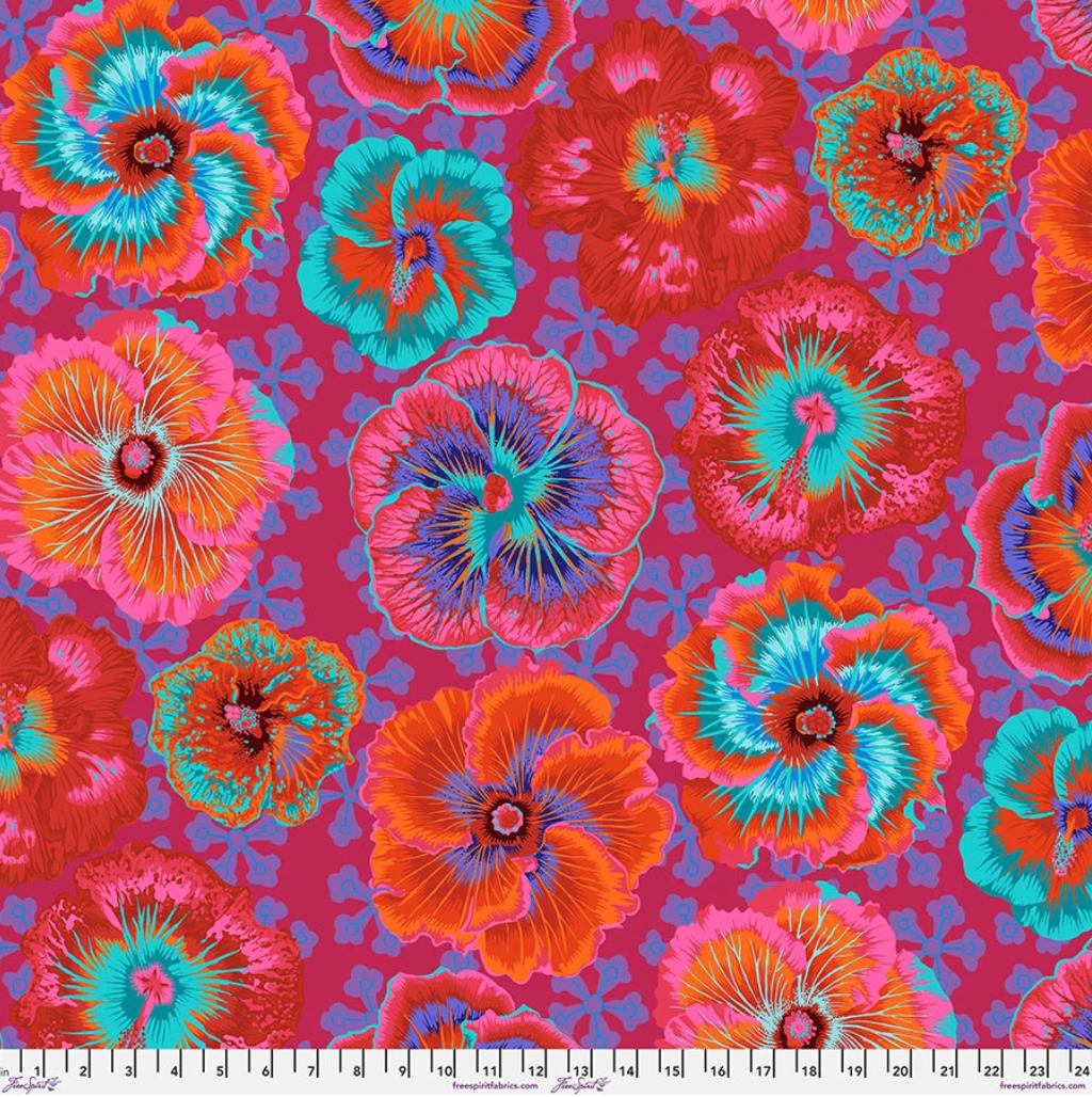 Floating Hibiscus Red fabric by Philip Jacobs for Kaffe Fassett Collective, featuring oversized red, orange, coral, pink, turquoise, aqua, and purple hibiscus flowers on a rich red background.