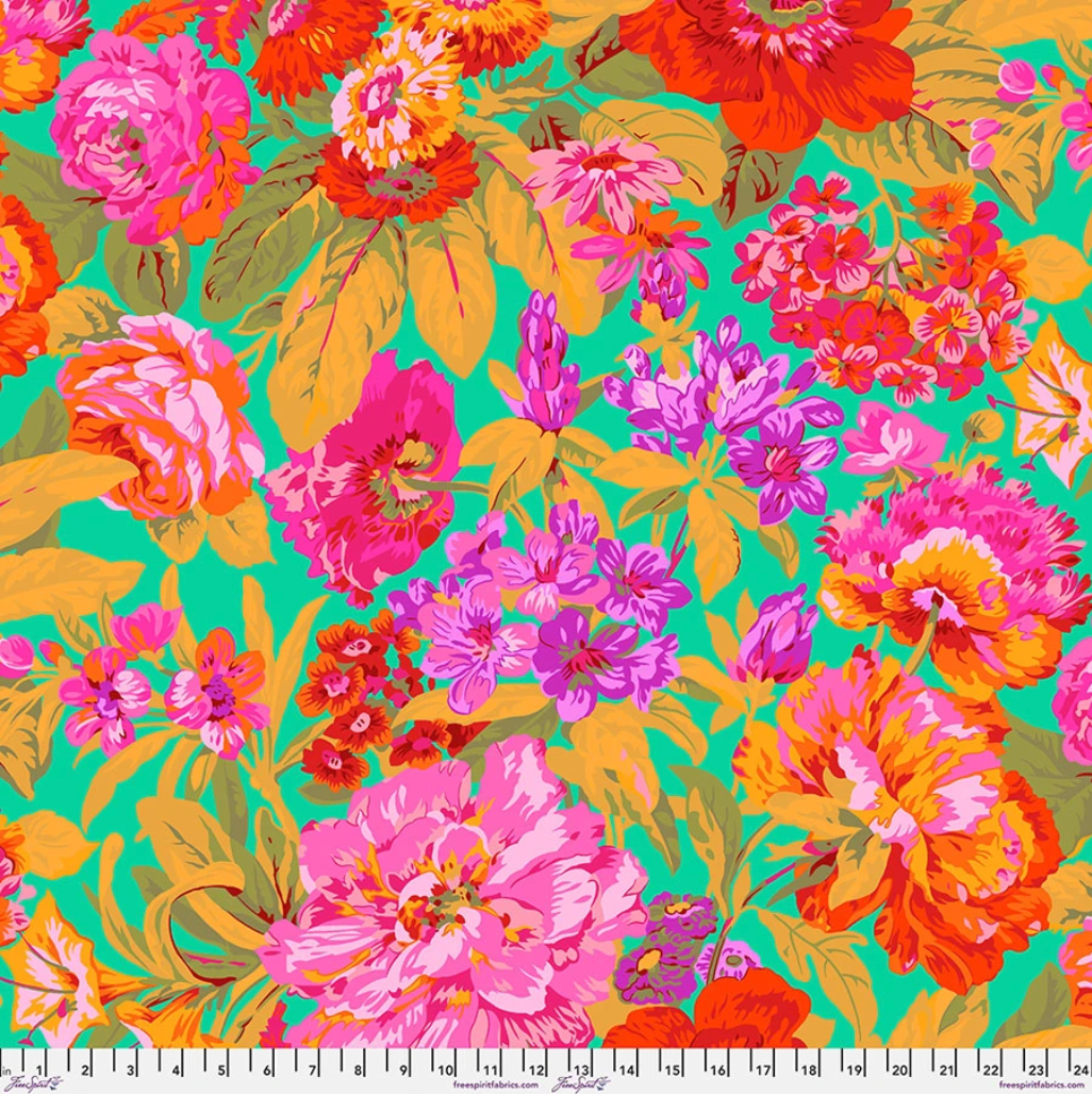 Voluptuous Green fabric by Philip Jacobs for Kaffe Fassett Collective, featuring oversized pink, orange, red, and purple flowers with mustard and olive foliage on a turquoise-green background.