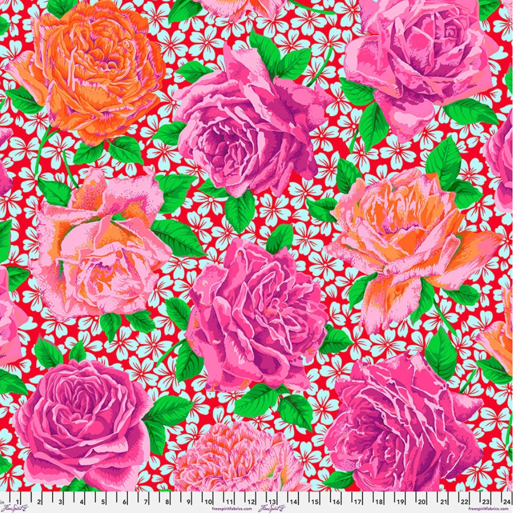 Rose Bloom Opera fabric by Philip Jacobs for Kaffe Fassett Collective, featuring oversized pink, magenta, coral, orange, and purple roses with green leaves on a vivid red background with aqua floral motifs.