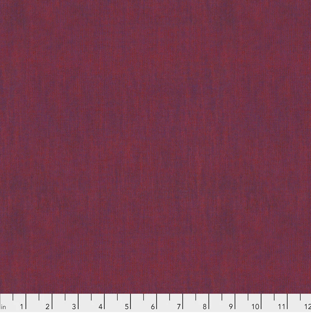 Kaffe Fassett Wine Shot Cotton fabric by FreeSpirit Fabrics, featuring a rich wine and burgundy yarn-dyed woven texture.