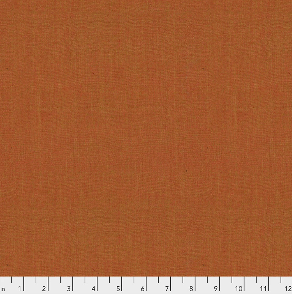Kaffe Fassett Shot Cotton Paprika fabric by FreeSpirit Fabrics, featuring a warm paprika orange yarn-dyed woven texture.
