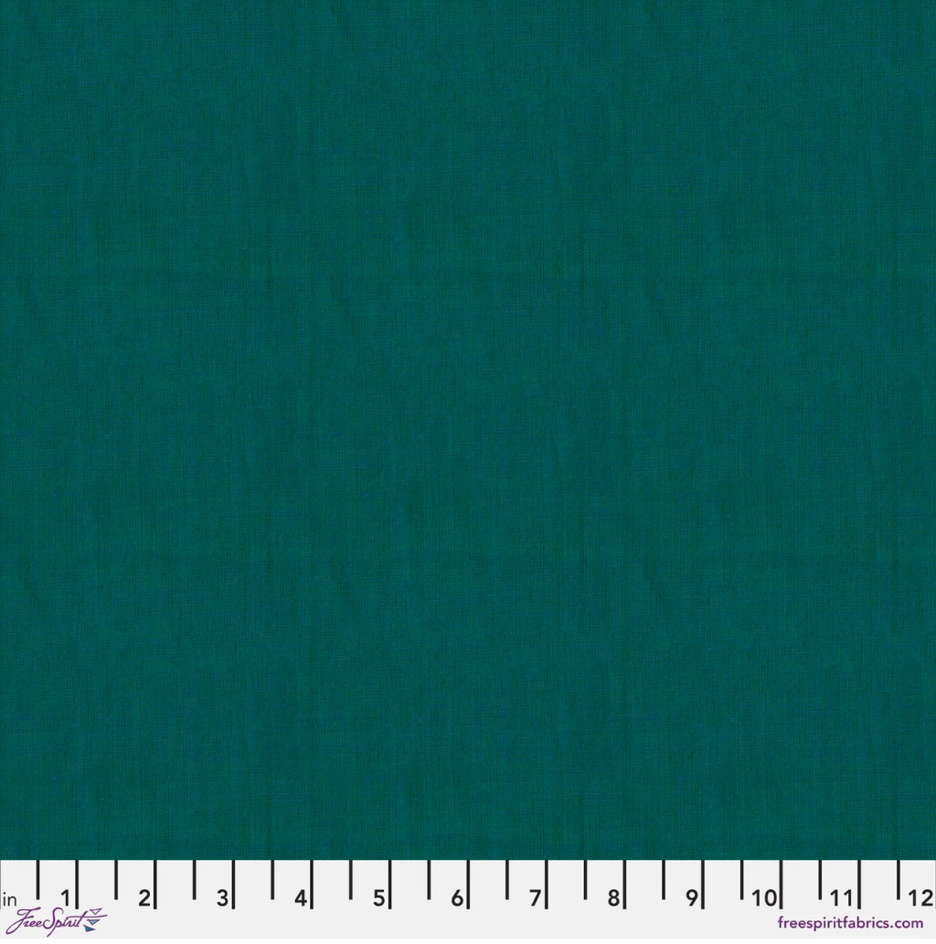 Kaffe Fassett Shot Cotton Emerald fabric by FreeSpirit Fabrics featuring a rich emerald green woven texture with subtle tonal variation.
