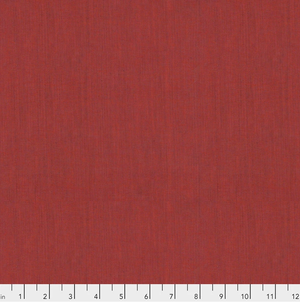 Kaffe Fassett Shot Cotton Blood Orange fabric by FreeSpirit Fabrics featuring a rich red-orange woven texture with subtle tonal variation.