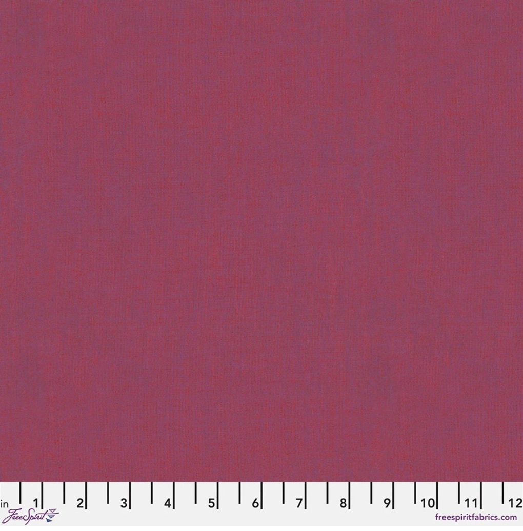 Kaffe Fassett Shot Cotton Raspberry fabric by FreeSpirit Fabrics featuring a rich raspberry pink woven texture with subtle tonal variation.