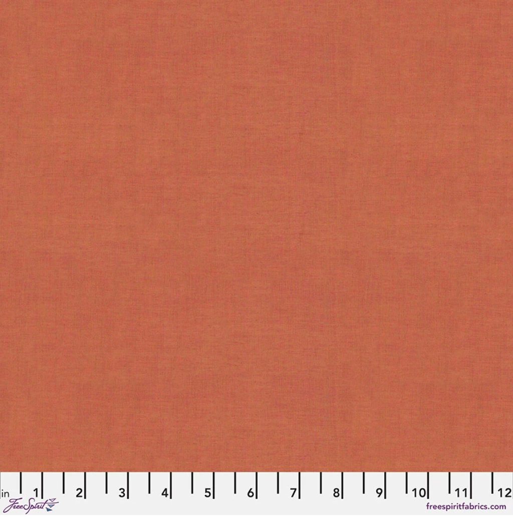Kaffe Fassett Shot Cotton Autumn fabric by FreeSpirit Fabrics featuring a warm burnt orange and terracotta woven texture.