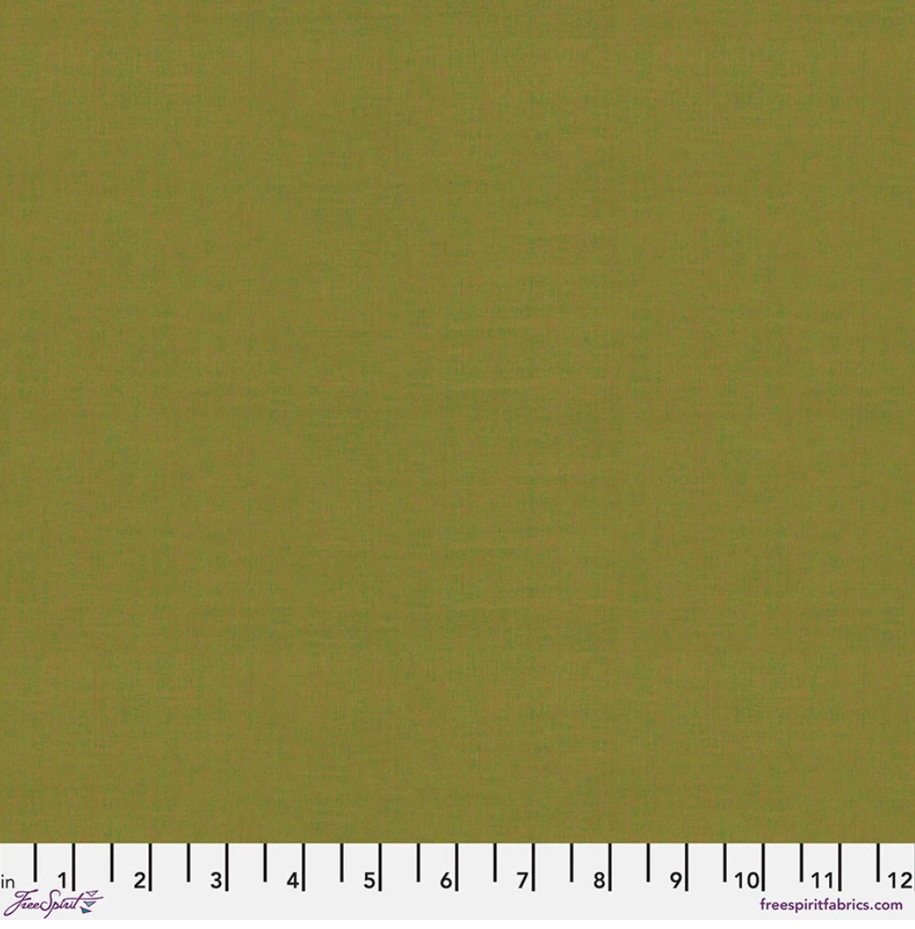 Kaffe Fassett Shot Cotton Algae fabric by FreeSpirit Fabrics featuring an earthy olive-green woven texture with subtle golden undertones.