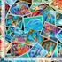 Sea Life Stamps cotton fabric by Timeless Treasures with dolphins, sea turtles, seahorses, tropical fish, coral, and ocean-themed stamps.