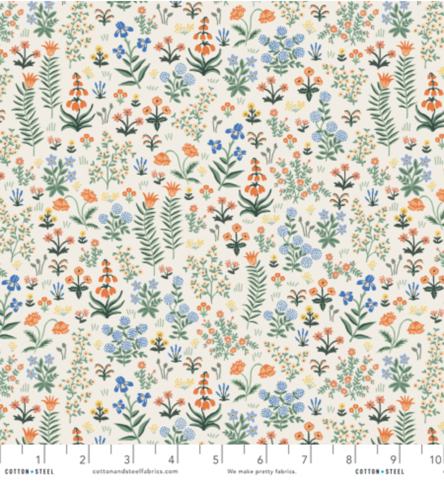Camont Menagerie Garden Cream quilting cotton by Rifle Paper Co. for Cotton + Steel has flowers and fern like leaves on a cream background.