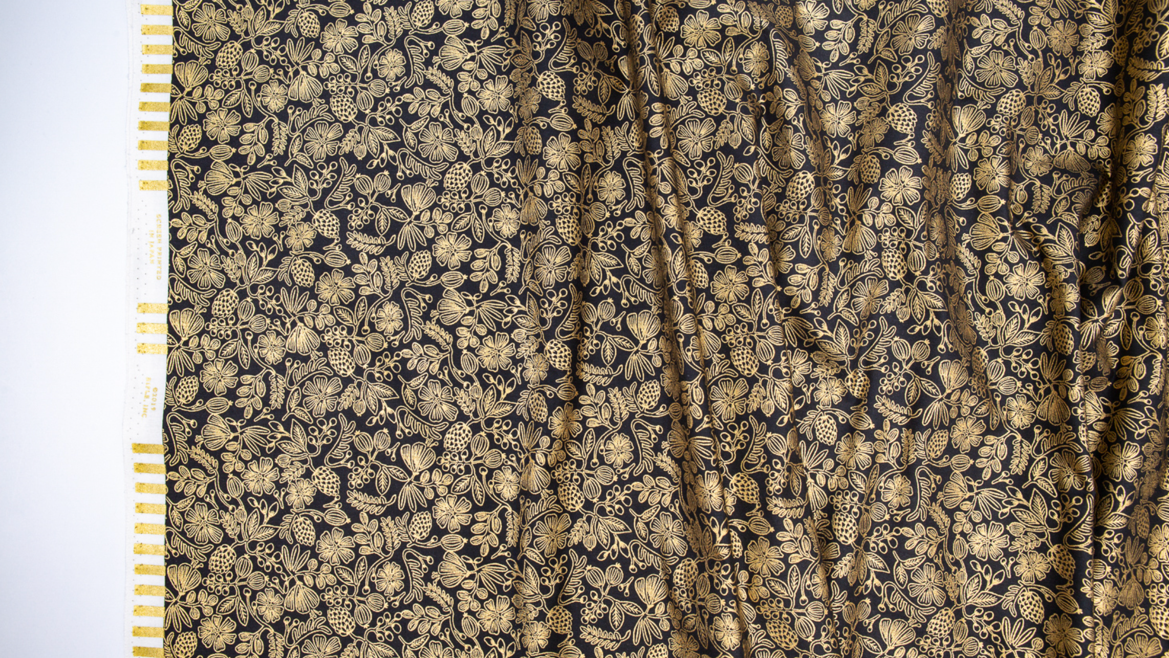 Moxie Florals Black Metallic Fabric by Rifle Paper Co. – bold floral cotton fabric with gold accents from Primavera collection.