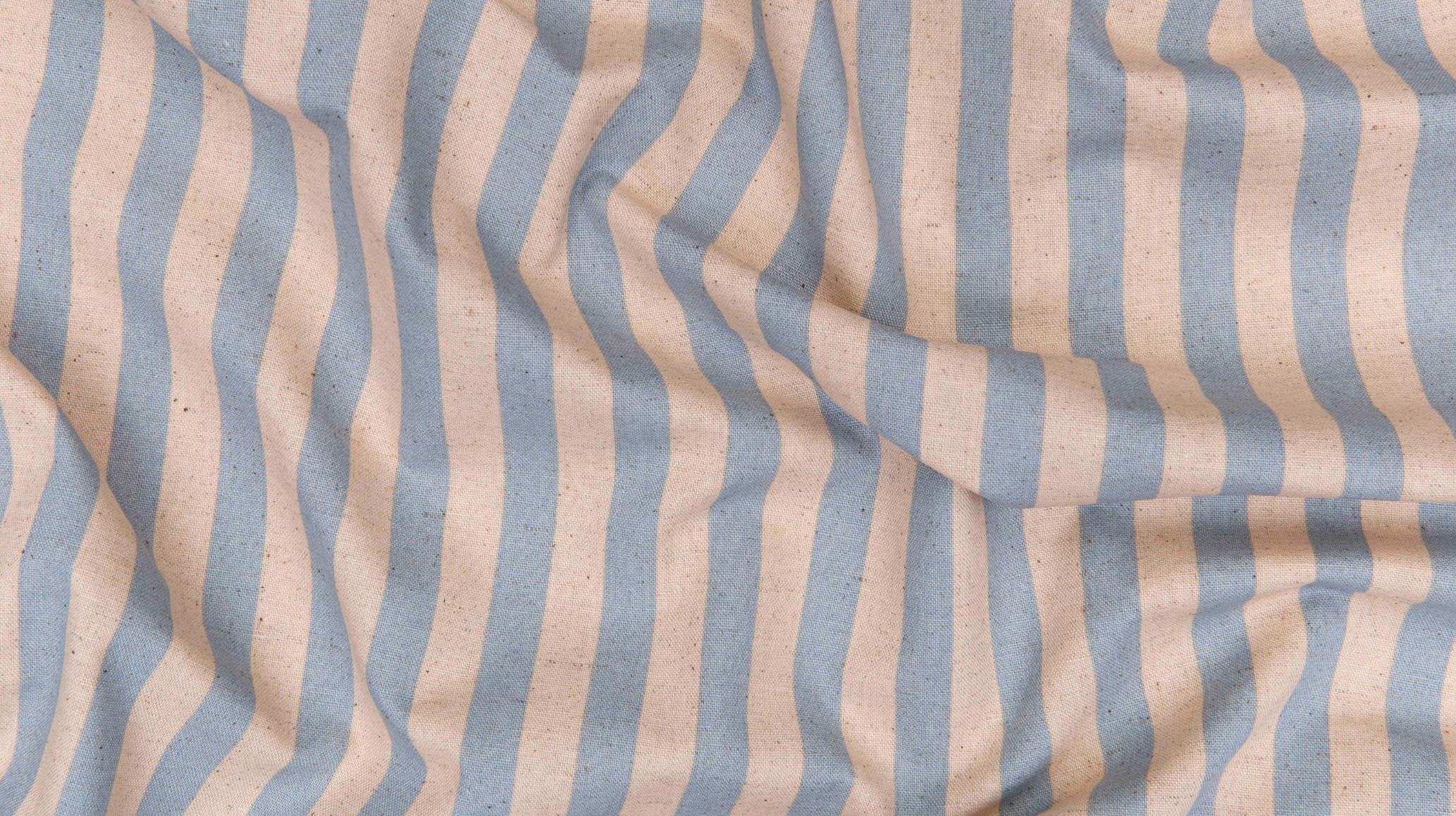 Primavera Cabana Stripe Periwinkle Canvas Fabric by Rifle Paper Co. for Cotton + Steel featuring wide blue and beige vertical stripes.