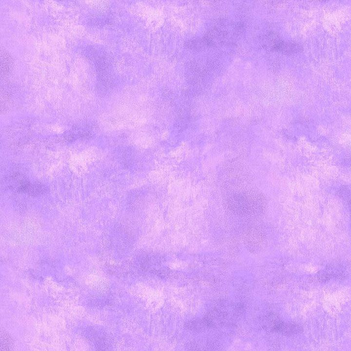 Tonal Sky Texture Lavender fabric by Timeless Treasures featuring a soft mottled watercolor texture in lavender, lilac, violet, and pale purple tones.