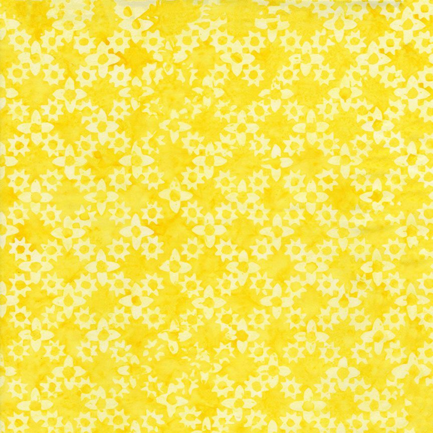 Flower Grove Sun Tonga Batik fabric by Timeless Treasures featuring small tonal floral shapes in bright yellow, golden yellow, and cream.