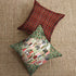Handmade reusable shopping bags and decorative throw pillows sewn from Tim Holtz Christmas Holly canvas fabric displayed in a cozy vintage-inspired holiday setting.