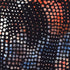 Stars & Dots America 108-inch wide batik quilt backing fabric by Timeless Treasures featuring scattered red, rust, blue, grey, cream, and white stars and dots on a black background.