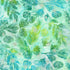 Artisan Batiks Evergreen Ice Sparkle Frosted Pinecones Turquoise batik fabric featuring green pinecones and evergreen branches with silver metallic accents on a turquoise and aqua hand-dyed background.