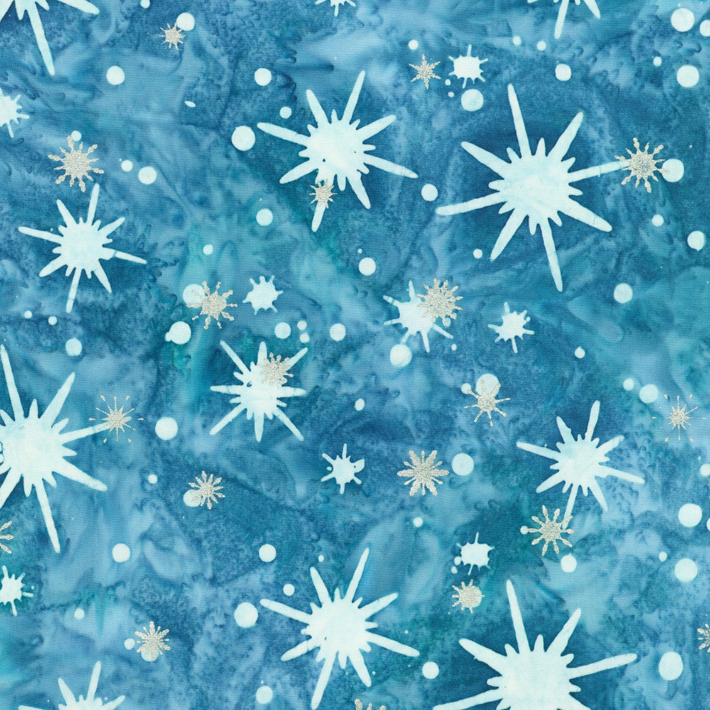 Artisan Batiks Evergreen Ice Sparkle Frosted Snowflakes Sky batik fabric featuring silver metallic snowflakes and icy white starbursts on a sky blue hand-dyed batik background.