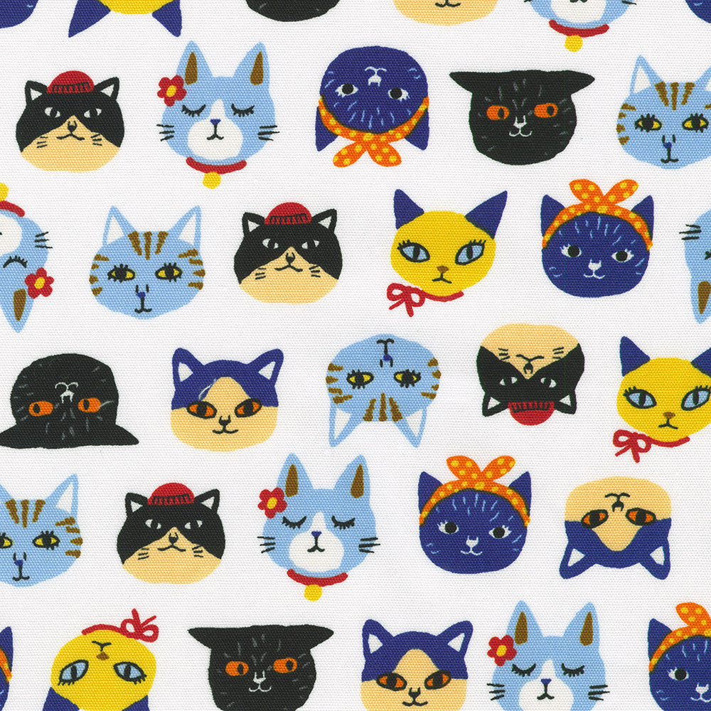 Sevenberry Japanese cotton canvas fabric featuring colorful cat faces on a white background by Robert Kaufman Fabrics.