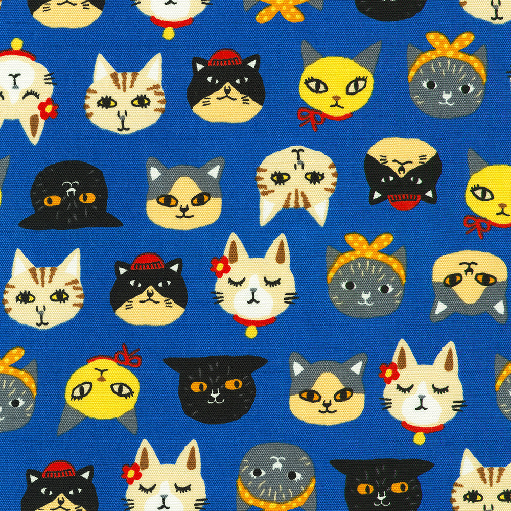 Sevenberry Canvas Cats Blue fabric by Robert Kaufman featuring colorful illustrated cat faces on a vibrant blue cotton canvas, perfect for bags, home décor, quilting, and fun sewing projects.