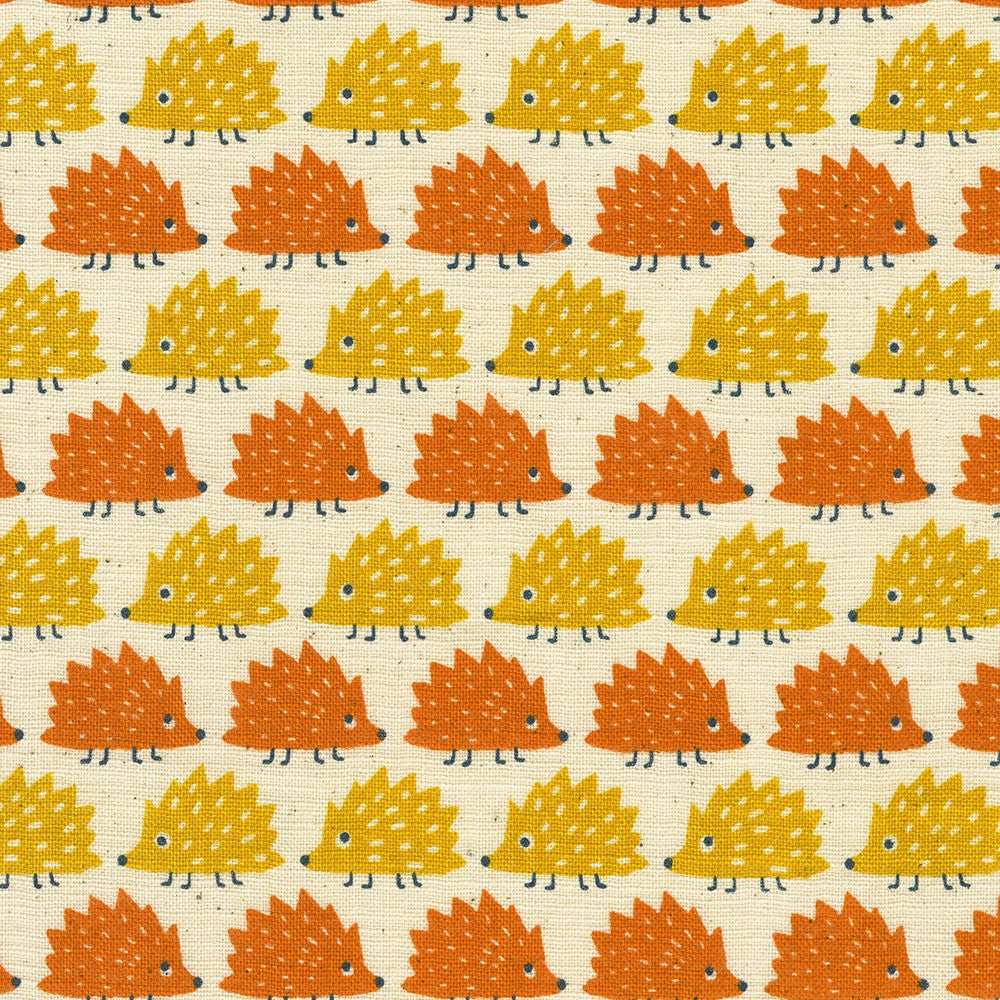 Sevenberry Cotton Slub Prints Hedgehogs fabric featuring adorable orange and yellow hedgehogs on a natural textured Japanese cotton slub background by Robert Kaufman, perfect for quilting, nursery décor, and children's sewing projects.